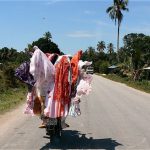 Fabric vendor on his motorbike - can't miss him.