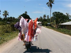 Fabric vendor on his motorbike - can't miss him.