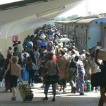 Hundreds and hundreds of passengers boarding