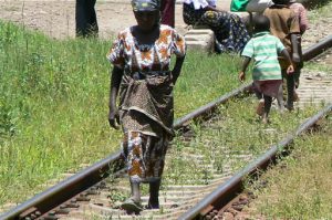 Train from Tanzania to Zambia - Woman & children walking