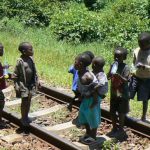 Poor children along the tracks