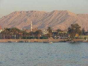 Crossing the Nile River to the hills of the Valley