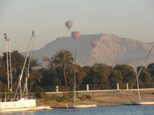 Crossing the Nile River to the hills of the Valley