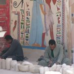 Carving alabaster objects at local souvenir shops in the Valley