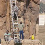 The Colossi of Memnon are two massive stone statues of