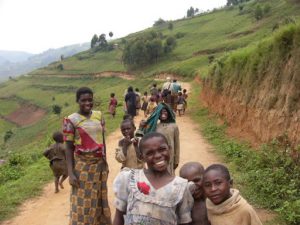 Children escorting tourists to pigmy village