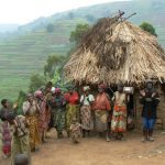 Lake Bunyonyi Pigmy villagers dance for tourists for money. These people