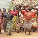 Lake Bunyonyi Pigmy villagers dancing for tourists.  These people came