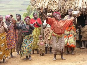 Lake Bunyonyi Pigmy villagers dancing for tourists.  These people came