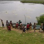 Lake Bunyonyi children greet tourists