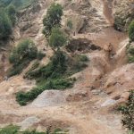 Lake Bunyonyi quarry where stone breakers break boulders into rocks