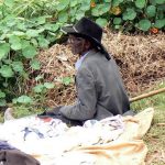 Lake Bunyonyi village market clothing vendor