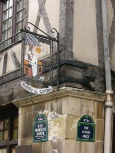 Paris - antique half-timbered houses and restaurant sign