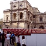 Seville - seats behind the cathedral ready for Semana Santa.