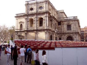 Seville - seats behind the cathedral ready for Semana Santa.