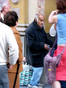 Seville - beggar at the door