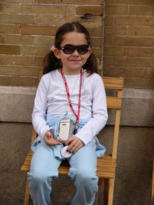 Seville - girl sitting in chair