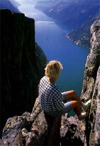Guy overlooking fjord