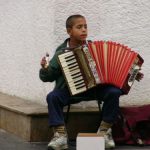 Zagreb - Gypsy (Roma) boy playing for coins