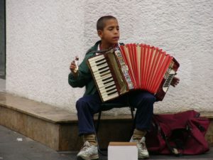 Zagreb - Gypsy (Roma) boy playing for coins