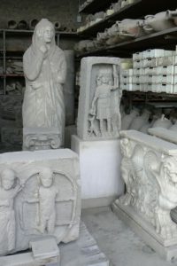 Italy - Pompeii ruins Decorative statues and reliefs.