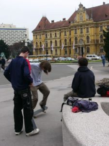 Skateboarders by the Croatian National Theatre (not seen in photo)