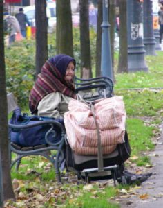 Zagreb - a bag lady; many Croatians live in poverty.