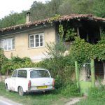 Rural House with Old Lada Car