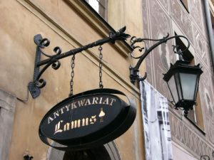 Poland, Warsaw City Antykwariat Lamus sign