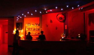 Inside a gay venue. Read the