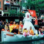 Gay pride boat playing music.