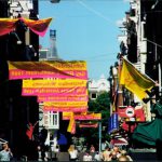 Amsterdam Gay Games banners hanging above the streets.