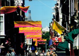 Amsterdam Gay Games banners hanging above the streets.