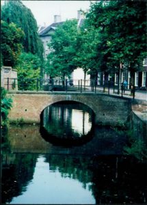 Photograph of a bridge with a reflection in the water