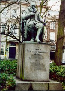 Public statue sits above the streets.