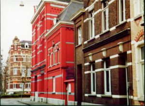 Red and brown brick buildings nestled side by side on