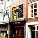 Two flags hang above the streets.