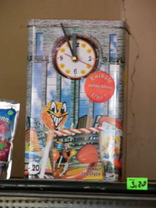 Kalisz rural area local store - cookie tin clock