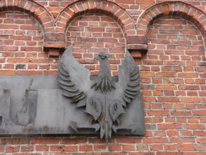 Kolobrzeg harbor lighthouse symbolic eagle