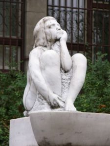 Pensive statue ("what's next?")