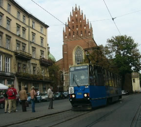Kraków - city center trolley and Dominican Church behind