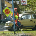 Crossing guard resting on his very