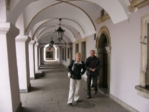 Zamosc center square - people in outside hallway