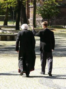 Poznan cathedral clergy young and old