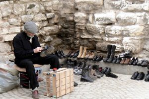 Shoe repairman by ancient
