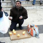 Vendor selling wind-up chicks in Uskudar