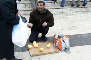 Vendor selling wind-up chicks in Uskudar