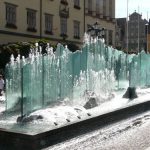 Modern glass fountain in the central
