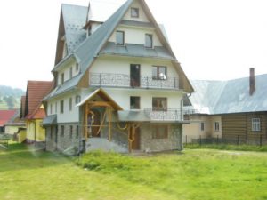 New steep roof apartment building--good for