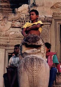 Angkor Wat boy on lion